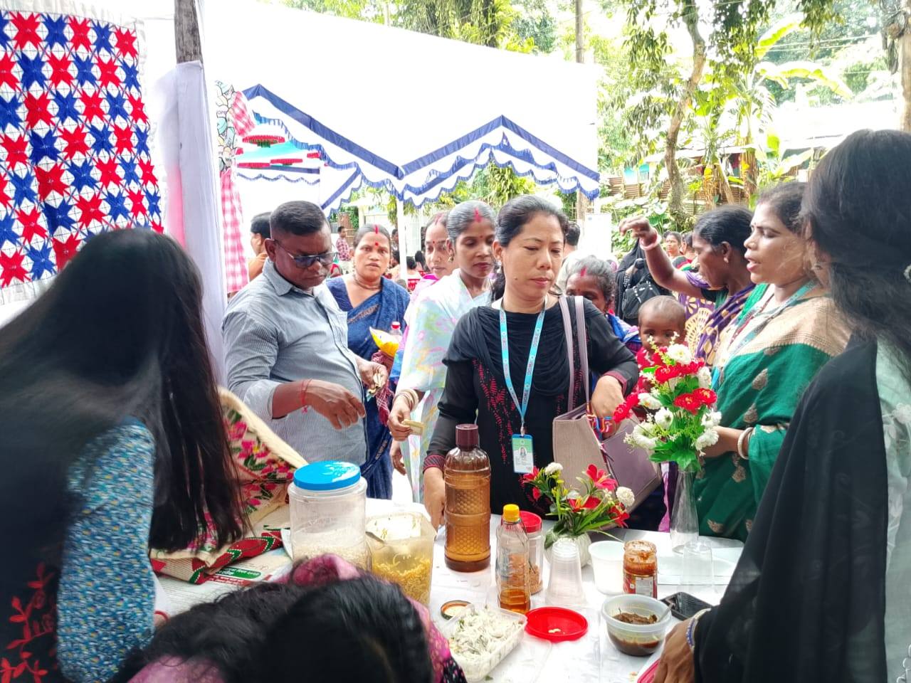 Women Entrepreneurs Displaying Local Products at a Community Exhibition and Fair